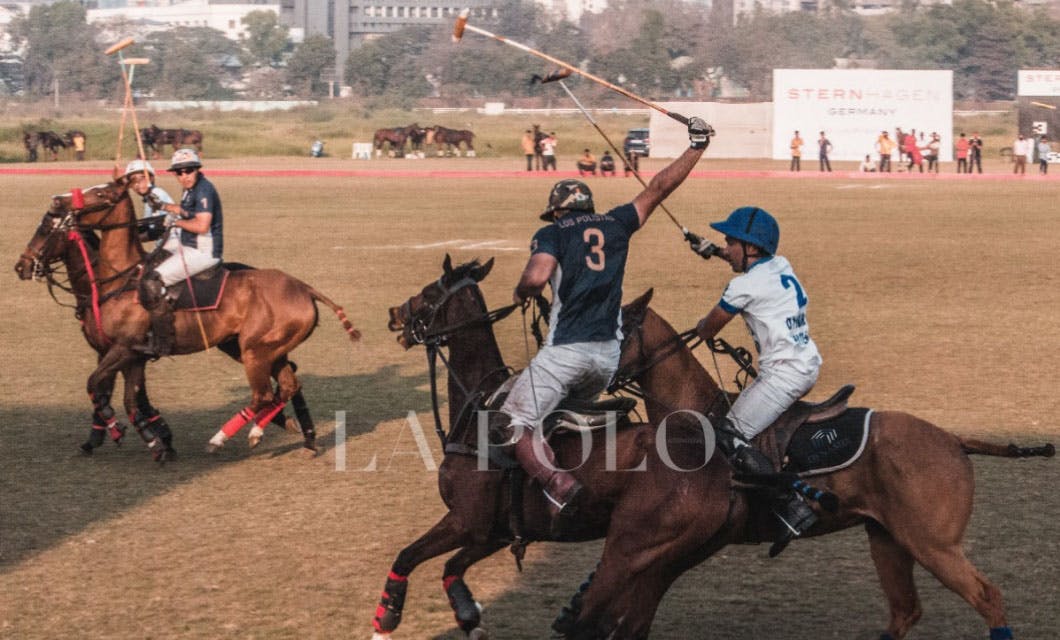 Battling it out, the polo players are in action